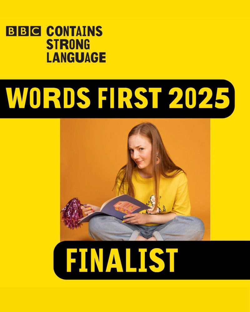 BBC contains strong language logo. In block letters on a bright yellow background - Words First 2025 Finalist. Image of young white woman with long red hair sat crossed legged, wearing a yellow tshirt and blue jeans, writing in a notebook with a pen with purple tassles. She is looking at the camera.
